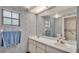 Bathroom with double vanity and shower/tub combo at 4616 Musket Dr, Lakeland, FL 33810