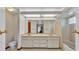 Bathroom boasts double vanity and a bathtub shower combo at 4616 Musket Dr, Lakeland, FL 33810