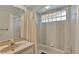 Updated bathroom with shower/tub and single vanity at 4616 Musket Dr, Lakeland, FL 33810