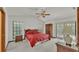Main bedroom with a king-size bed and wood furniture at 4616 Musket Dr, Lakeland, FL 33810