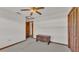 Bright bedroom with ceiling fan and vintage wooden chest at 4616 Musket Dr, Lakeland, FL 33810