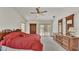 Primary bedroom with king bed, access to backyard, and lots of natural light at 4616 Musket Dr, Lakeland, FL 33810