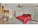 Spacious Primary bedroom with a king-size bed and en-suite bathroom access at 4616 Musket Dr, Lakeland, FL 33810