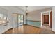 Light and airy dining room with wood flooring and access to a sliding glass door at 4616 Musket Dr, Lakeland, FL 33810