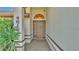 Front entrance with walkway and decorative door at 4616 Musket Dr, Lakeland, FL 33810