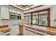Kitchen features wood cabinets, built-in microwave and ample counter space at 4616 Musket Dr, Lakeland, FL 33810