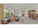 Living room with plaid couch and wood coffee table at 4616 Musket Dr, Lakeland, FL 33810