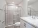 Bathroom with shower stall, toilet and vanity with marble countertop at 5108 Sylas Jax Ave, Winter Haven, FL 33884