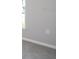 Simple bedroom with gray walls and neutral carpeting at 5108 Sylas Jax Ave, Winter Haven, FL 33884