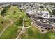 Community overview showcasing golf course and clubhouse at 6064 Condor Dr, Lakeland, FL 33809