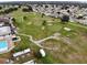 Golf course and community clubhouse with pool at 6064 Condor Dr, Lakeland, FL 33809