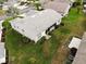Aerial view showing home and landscaping at 6064 Condor Dr, Lakeland, FL 33809
