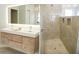 Elegant bathroom featuring a double vanity and walk-in shower at 6064 Condor Dr, Lakeland, FL 33809