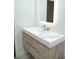 Modern bathroom with floating vanity and LED mirror at 6064 Condor Dr, Lakeland, FL 33809