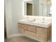 Modern bathroom with double vanity and updated fixtures at 6064 Condor Dr, Lakeland, FL 33809