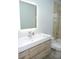 Modern bathroom with floating vanity and LED mirror at 6064 Condor Dr, Lakeland, FL 33809