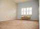 Empty bedroom with neutral wall colors and wood desk at 6064 Condor Dr, Lakeland, FL 33809