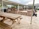 Outdoor kitchen with grills and picnic tables for community gatherings at 6064 Condor Dr, Lakeland, FL 33809