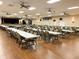 Large community hall with tables and chairs, ready for events at 6064 Condor Dr, Lakeland, FL 33809