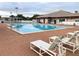 Relax by the refreshing community pool with lounge chairs at 6064 Condor Dr, Lakeland, FL 33809