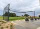 Covered driving range with multiple hitting bays at 6064 Condor Dr, Lakeland, FL 33809