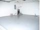 Attached garage with freshly painted floor at 6064 Condor Dr, Lakeland, FL 33809
