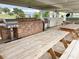 Community grilling area with built-in grills and picnic tables at 6064 Condor Dr, Lakeland, FL 33809