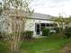 Well-maintained house with screened patio and landscaping at 6064 Condor Dr, Lakeland, FL 33809