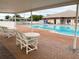 Inviting community pool with patio seating at 6064 Condor Dr, Lakeland, FL 33809