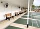 Shuffleboard courts with benches under covered area at 6064 Condor Dr, Lakeland, FL 33809