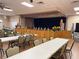 Community room with a stage and comfortable seating at 6064 Condor Dr, Lakeland, FL 33809