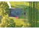 House with dark roof, garden, and blueberry farm at 6155 Bethlehem Rd, Mulberry, FL 33860