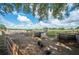 Animal enclosure with wooden fencing, hay bales and tires for play at 6155 Bethlehem Rd, Mulberry, FL 33860