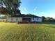 Home with deck and spacious backyard at 6155 Bethlehem Rd, Mulberry, FL 33860