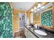 Modern bathroom with double vanity and tropical shower curtain at 6155 Bethlehem Rd, Mulberry, FL 33860