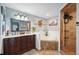 Elegant bathroom with double vanity, garden tub, and walk-in shower at 6155 Bethlehem Rd, Mulberry, FL 33860