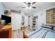 Charming bedroom with a ceiling fan and plenty of closet space at 6155 Bethlehem Rd, Mulberry, FL 33860