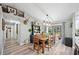 Rustic farmhouse dining area with a view of the backyard at 6155 Bethlehem Rd, Mulberry, FL 33860