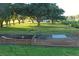 Farm with house, fenced play area, and large oak trees at 6155 Bethlehem Rd, Mulberry, FL 33860