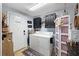 Convenient laundry room with washer, dryer, and ample storage at 6155 Bethlehem Rd, Mulberry, FL 33860