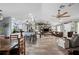 Open concept living area with a kitchen and vaulted ceiling at 6155 Bethlehem Rd, Mulberry, FL 33860