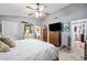 Main bedroom with en-suite bathroom access and walk-in closet at 6155 Bethlehem Rd, Mulberry, FL 33860