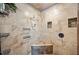 Large walk-in shower with tiled walls and built-in shelving at 6155 Bethlehem Rd, Mulberry, FL 33860