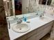 Double vanity bathroom with updated sinks and fixtures at 6718 Trail Ridge Dr, Lakeland, FL 33813