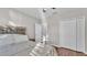 Bedroom with queen bed, nightstand and double door closet at 6799 Glenbrook Dr, Lakeland, FL 33811