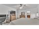 Bedroom with large bed, dresser, and en-suite bathroom access at 6799 Glenbrook Dr, Lakeland, FL 33811