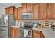 Well-equipped kitchen featuring stainless steel appliances and ample cabinetry at 6799 Glenbrook Dr, Lakeland, FL 33811