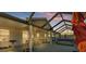 Covered patio with hot tub, outdoor furniture, and grill at 6799 Glenbrook Dr, Lakeland, FL 33811