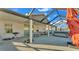 Covered patio with hot tub, outdoor furniture, and grill at 6799 Glenbrook Dr, Lakeland, FL 33811