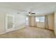 Large bedroom with ceiling fan and window with curtains at 718 Barber Cir # 718, Lakeland, FL 33803